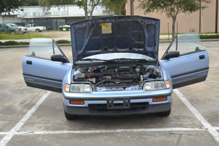 Illustration for article titled For
$4,450, This 1989 Honda CRX Flips Its Lid